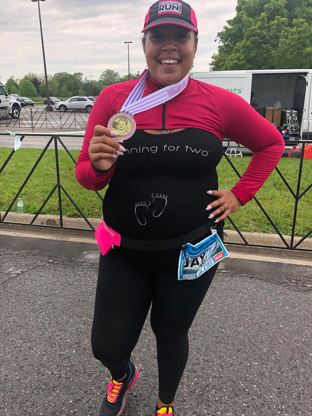 Jay Ell Alexander with a medal around her neck after running a race.