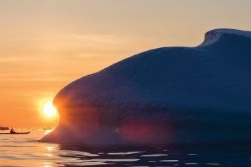 Kayaker paddling in Illuissat, Greenland
