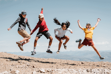 Kids jump for joy in Yellowstone National Park