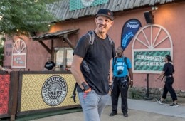 Mick Ebeling standing in front of the camera and smiling.