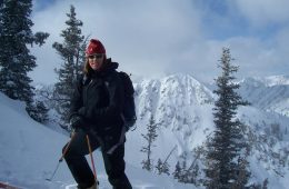A hiker stands in front of a peak outside Salt Lake City