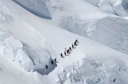 The drilling team hikes up Huascarán in 2019.