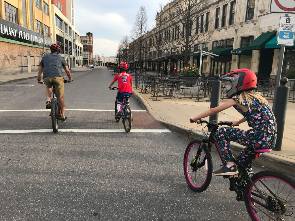 Graham Averill and his kids on their bikes in Asheville, NCC