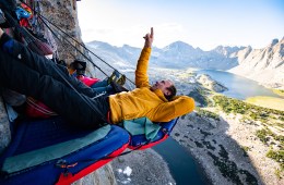 Jesse Huey and Maury Birdwell relax at the hanging portaledge camp high on Mt. Hooker, Wind River Range, Wyoming, USA. In August of 2019 the pair finished their multi-year project Gambling In The Winds (5.12+)