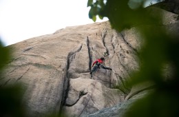 Shelma Jun climbing on a rock face in South Korea.