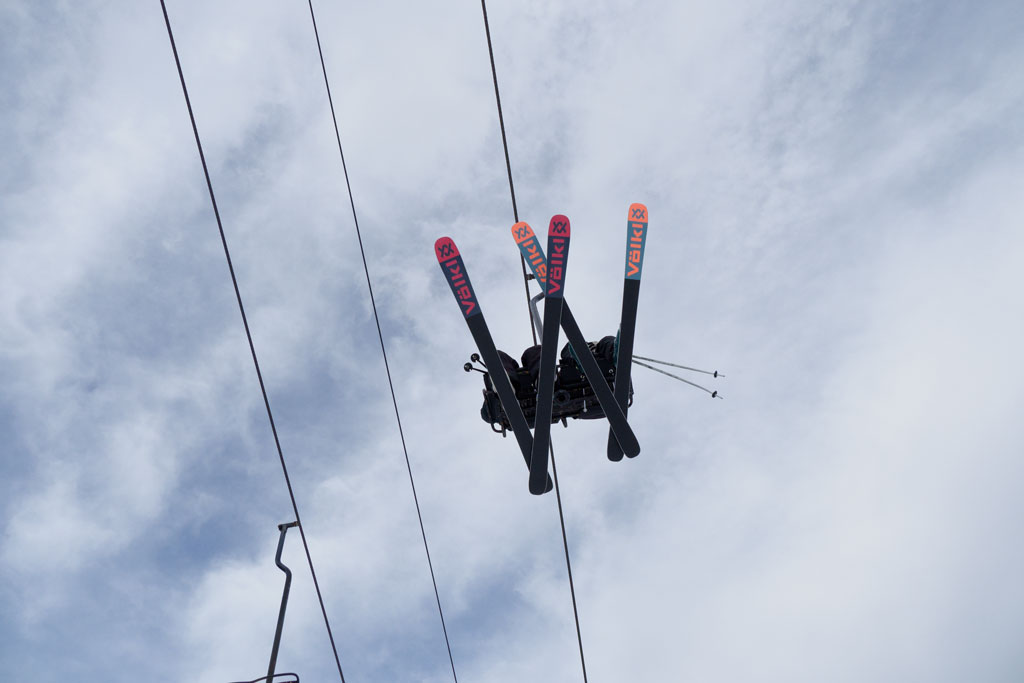 Skiers on a chair lift