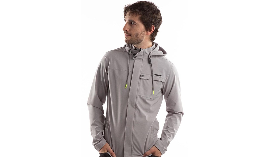 Person wearing grey cycling jacket.