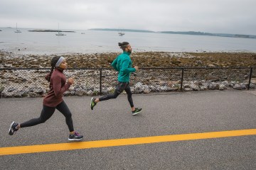 Two runners on a path