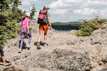 A family hikes together.