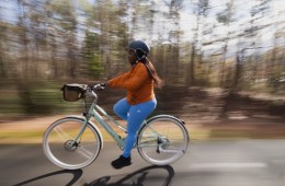 A person riding a bike on a bike path.