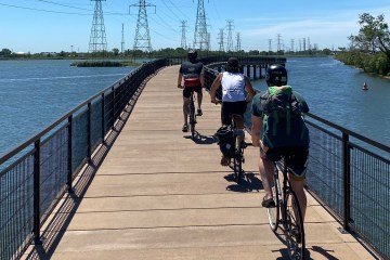 Artist Brian Rau rides with friends in Chicago