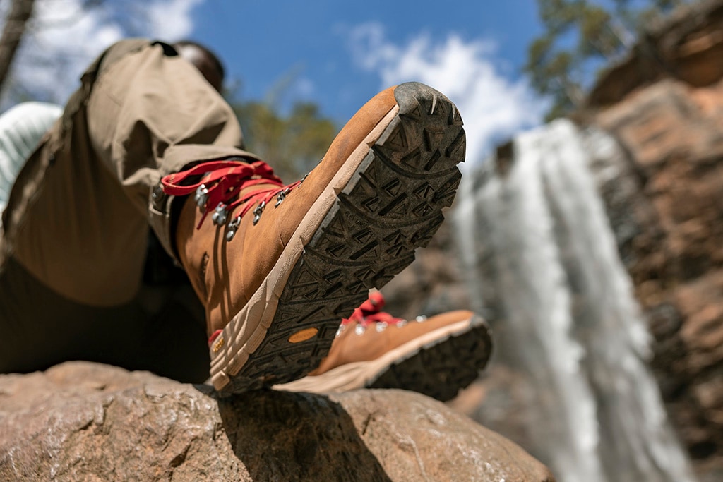 The bottom of a pair of Danner hiking boots from below.