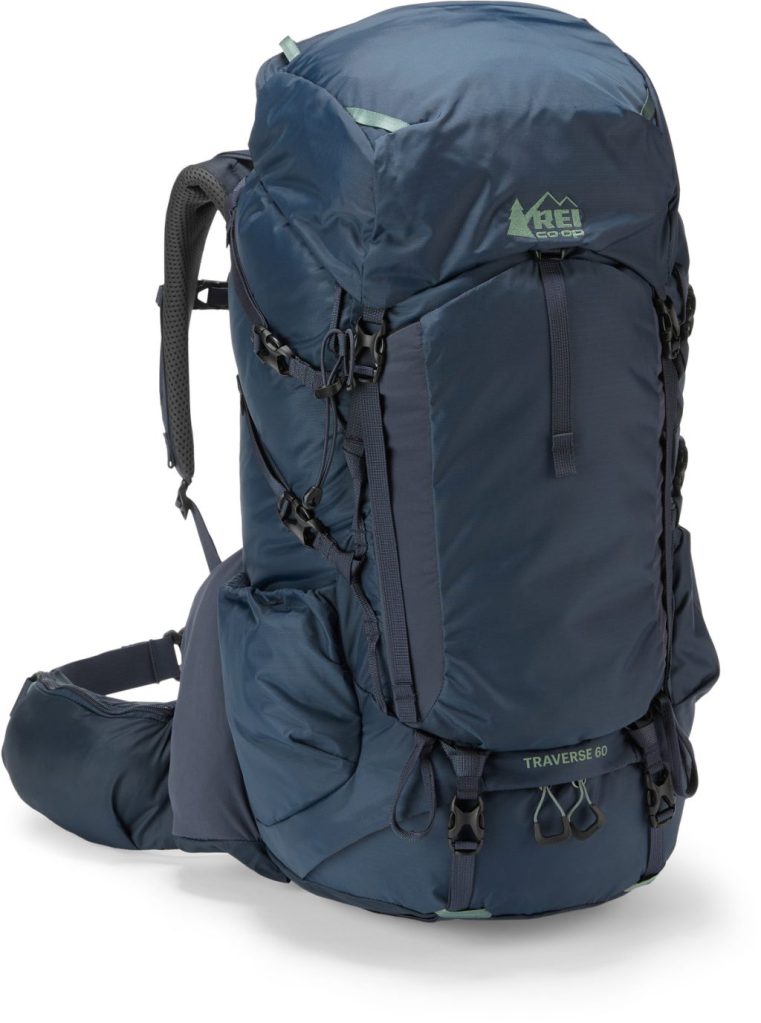 A dark blue REI Co-op Traverse 60 Pack against a white background