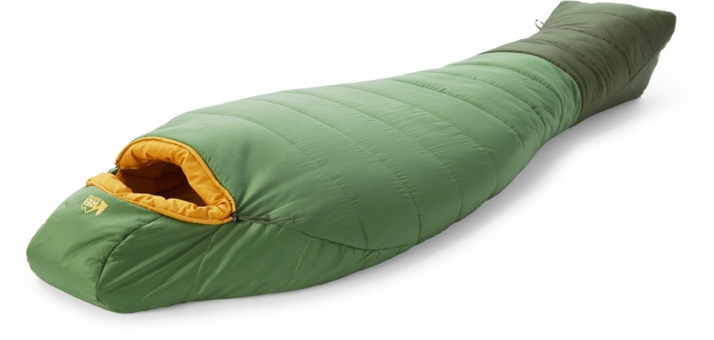 A green REI Co-op Trailmade Sleeping Bag laying on a white background