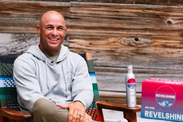 shane dorian sitting in a chair