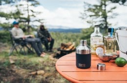 Image of several spirits on a camp table.