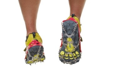A calf-down rear shot of a person in the Kahtoola MICROspikes.