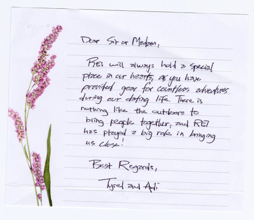 A note written on lined paper with a flower design on the side border.