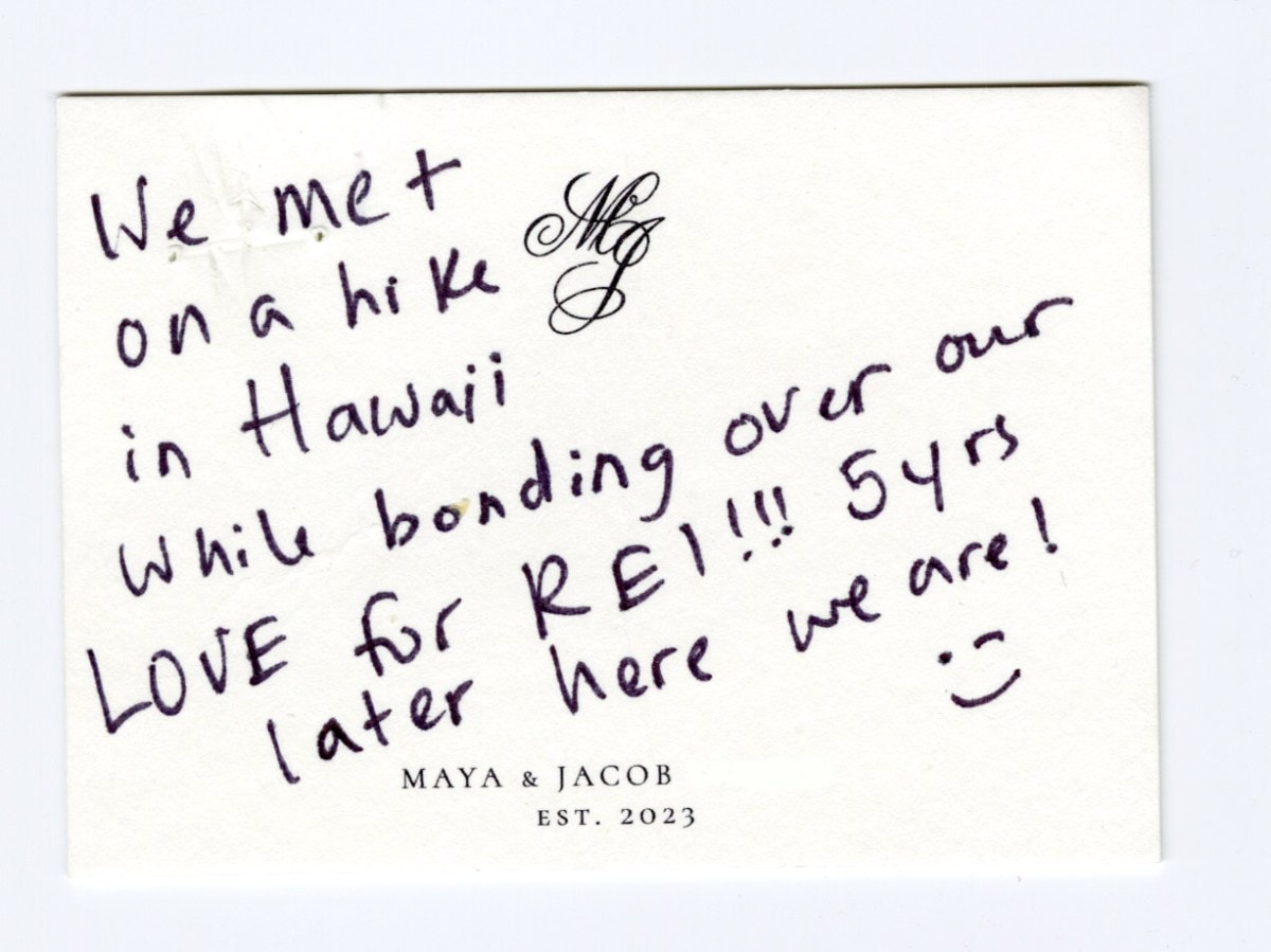 A short note written on a couple's monogrammed and personalized stationery. 