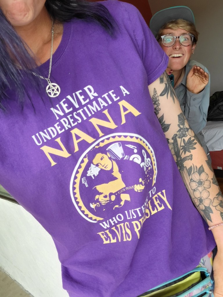 Lyla Harrod wears a shirt that says "Never Underestimate a Nana Who Listens to Elvis Presley."