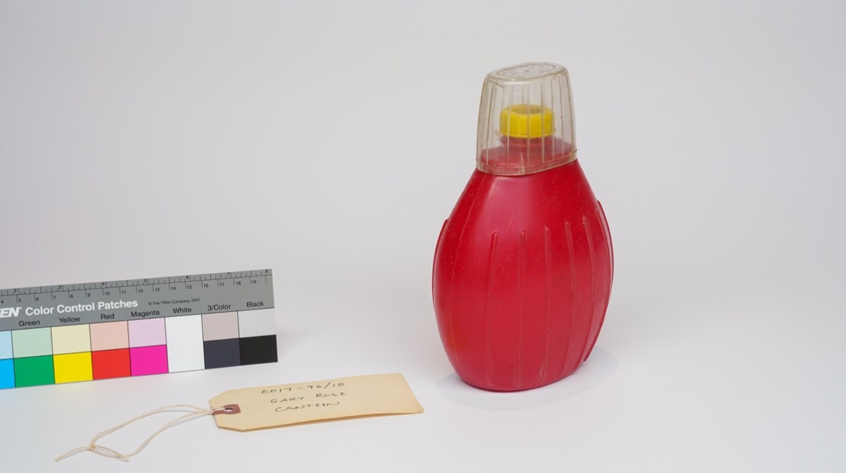 an old red plastic canteen