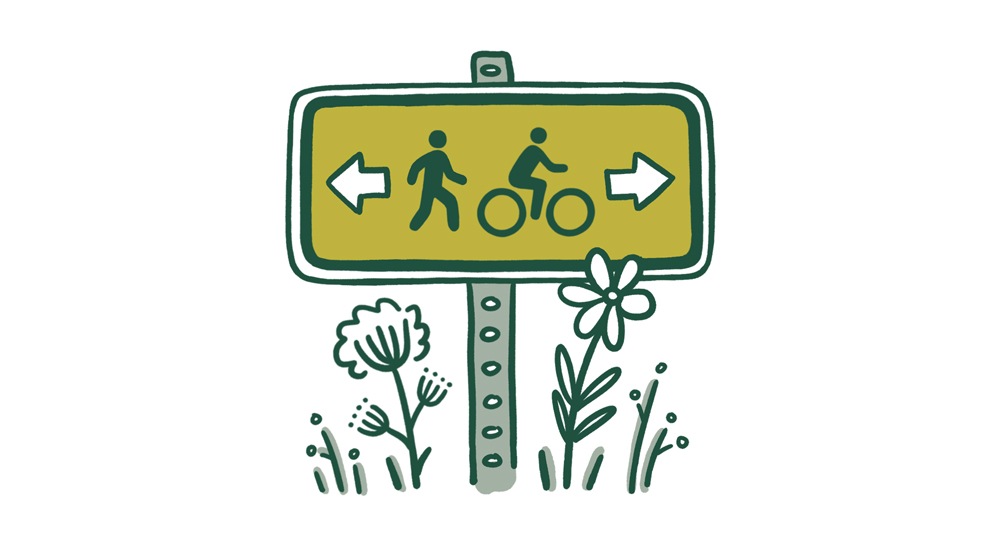 An illustration of a signpost as on a trail, indicating right of way for pedestrians and cyclists.