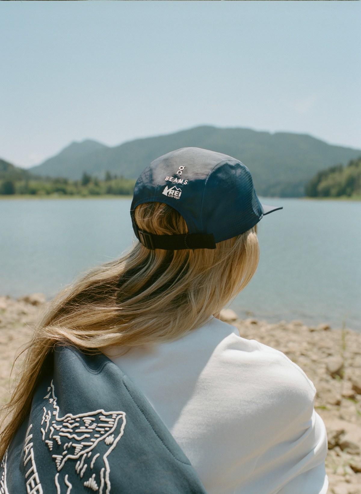 A close up of the back of the On x BEAMS x REI Co-op collaborative hat.