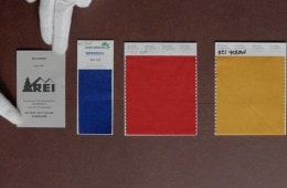 Swatches from the REI color palette, including blue red and yellow.