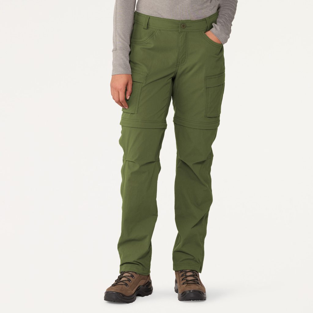 A person shown from the waist down, modeling an olive green pair of convertible pants against a white background