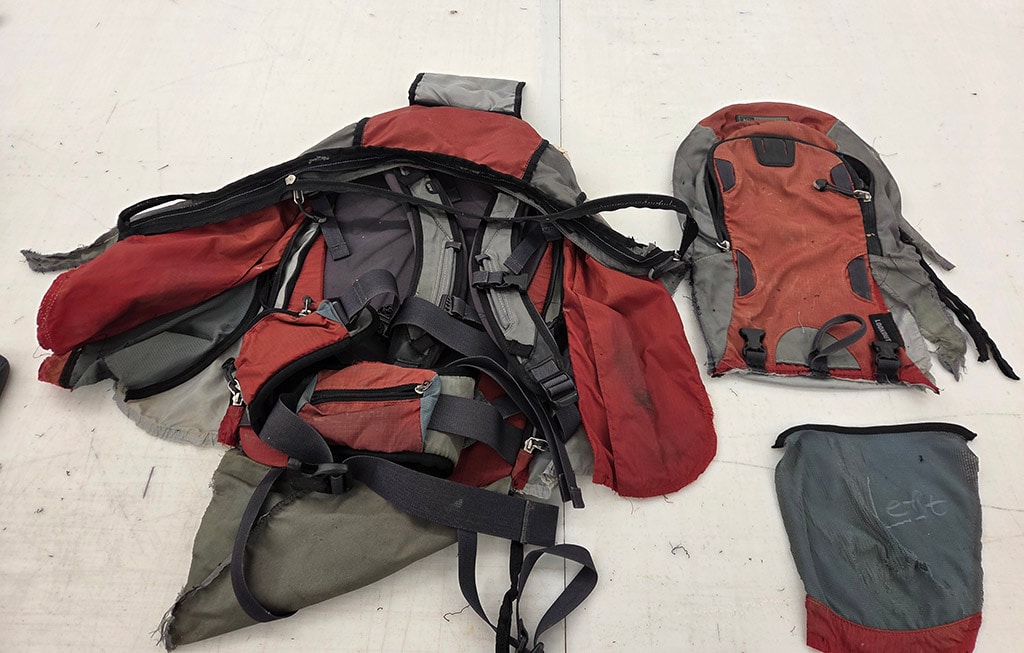 The pieces of a pack, deconstructed and laid out on a table