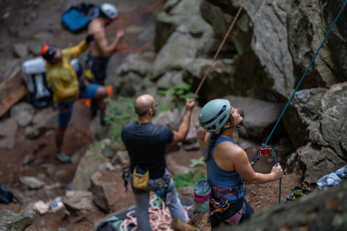 Climbers are the base of a granite wall belay others at the Arc'teryx Academy in Squamish, B.C.