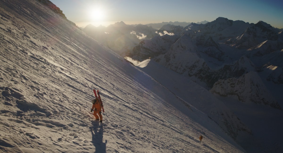 Jim Morrison climbs Everest with a team member behind him.