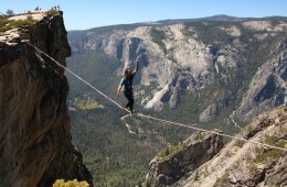 Breannah Yeh slacklining between two mountains.