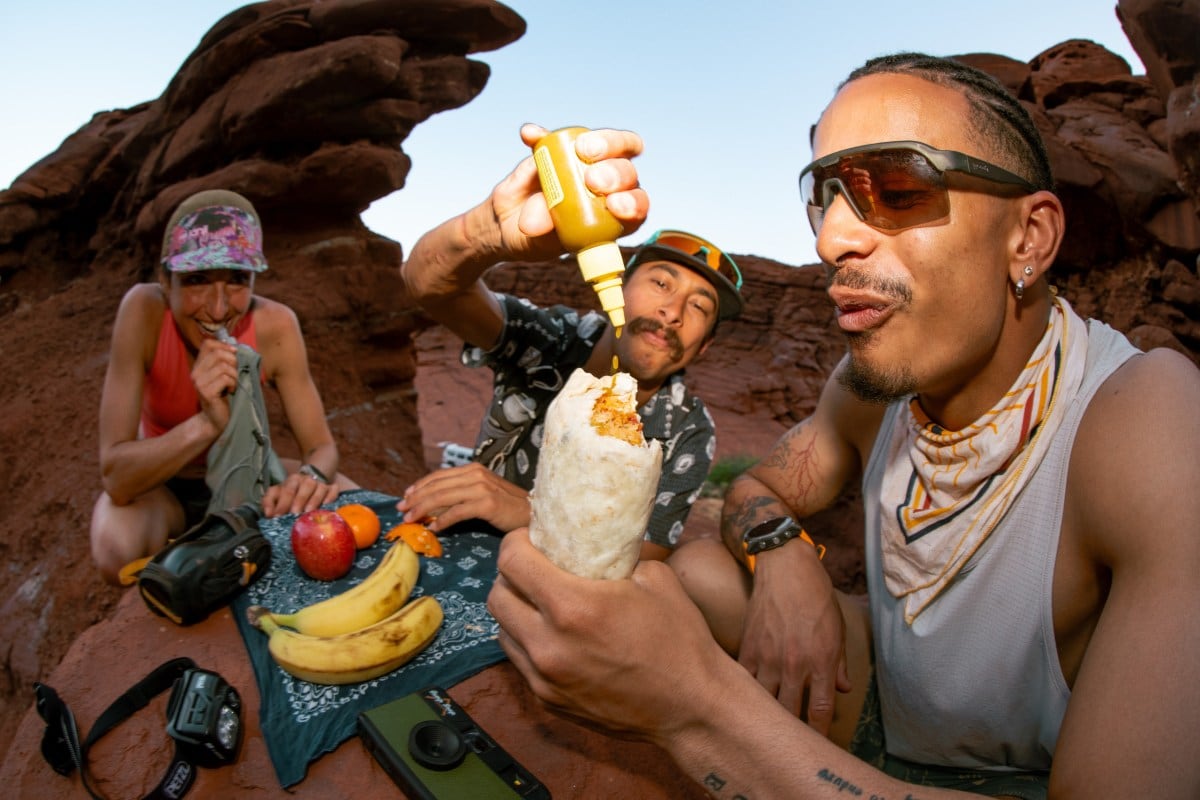 Three people eating after a run