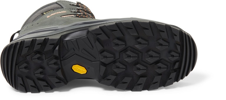 A pair of Lowa Renegade backpacking boots shown from their side, with their sole exposed