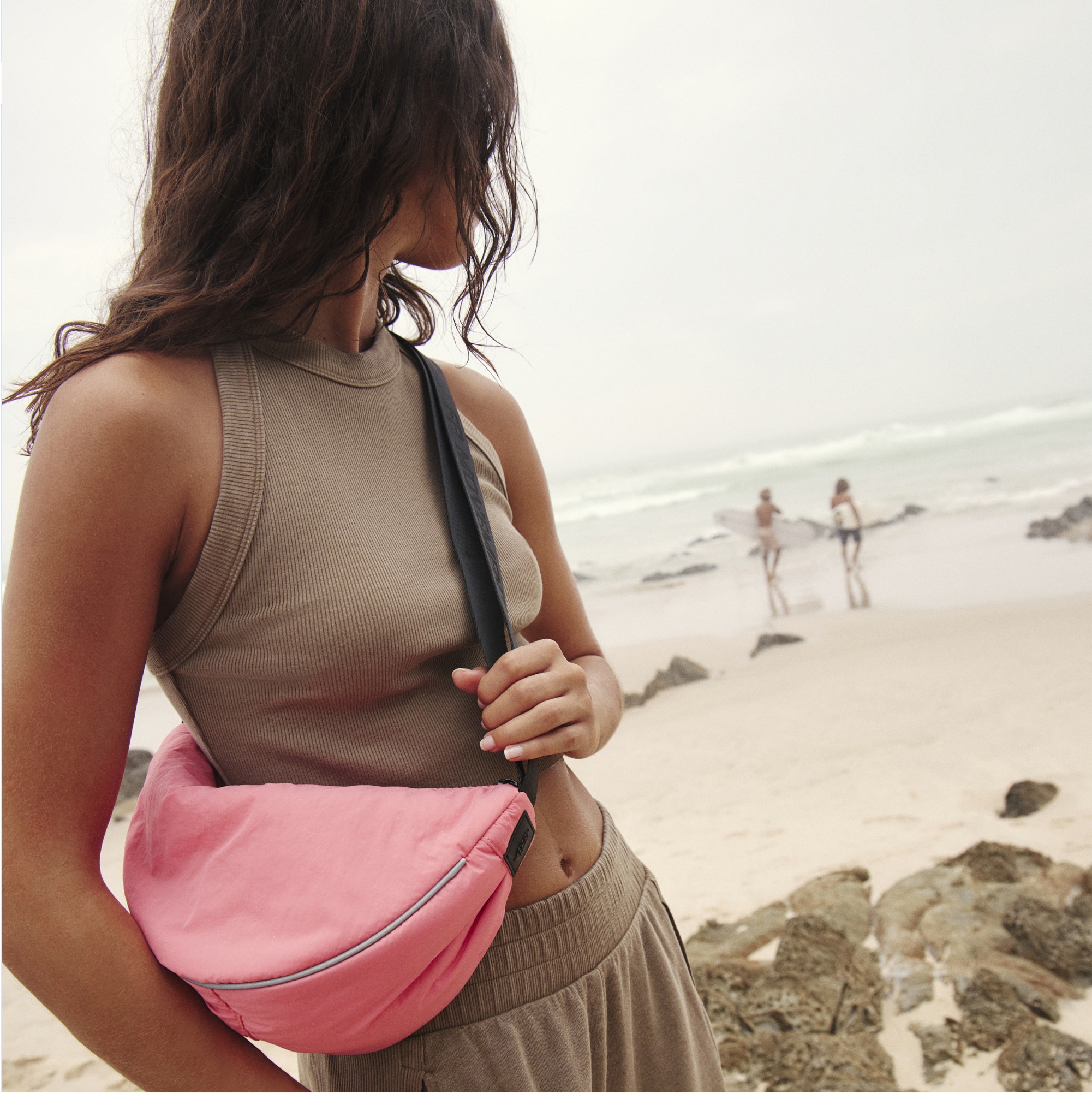 A person looking off into the distance while wearing FP Movement.