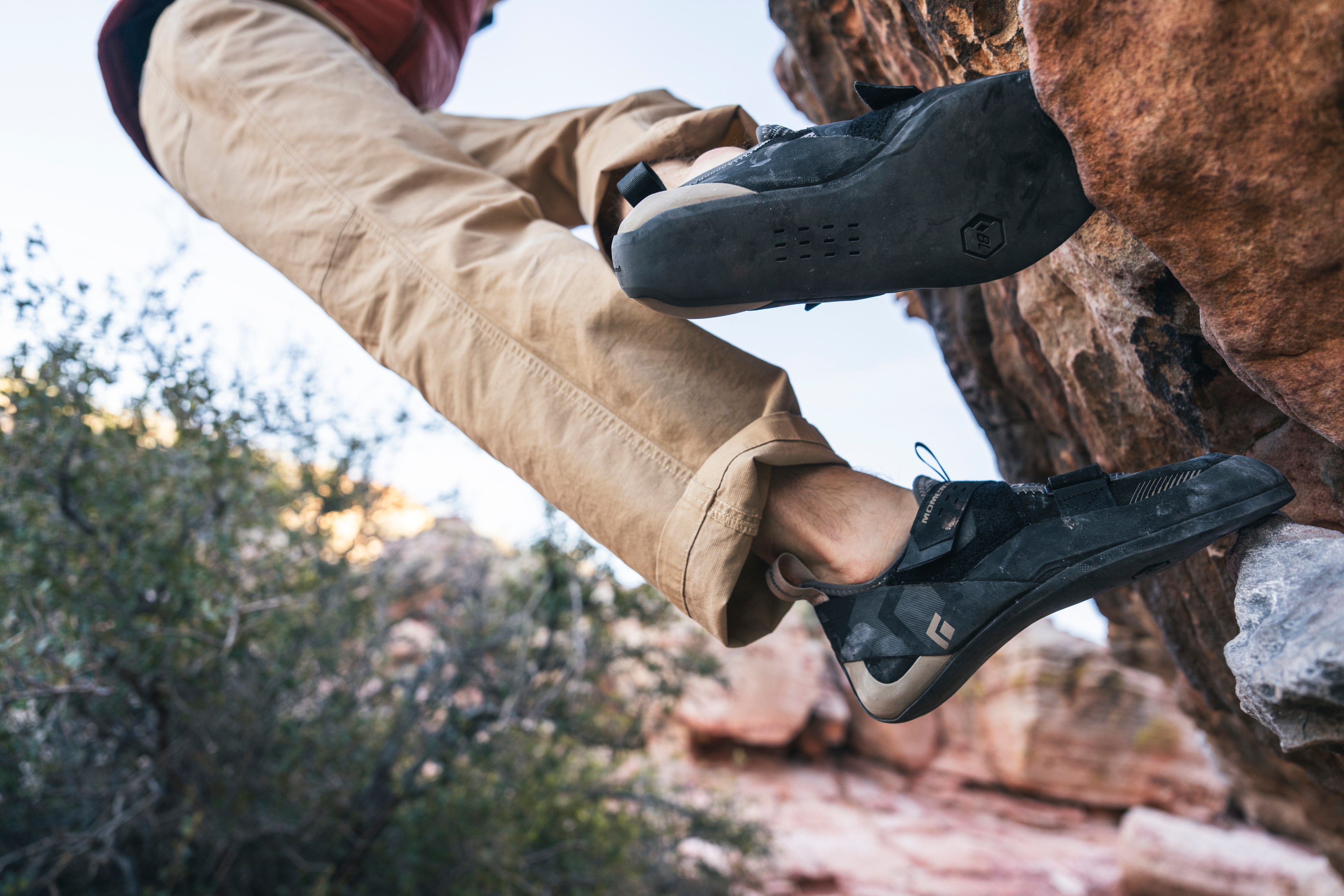 A person climbs in their Black Diamond Momentum climbing shoes
