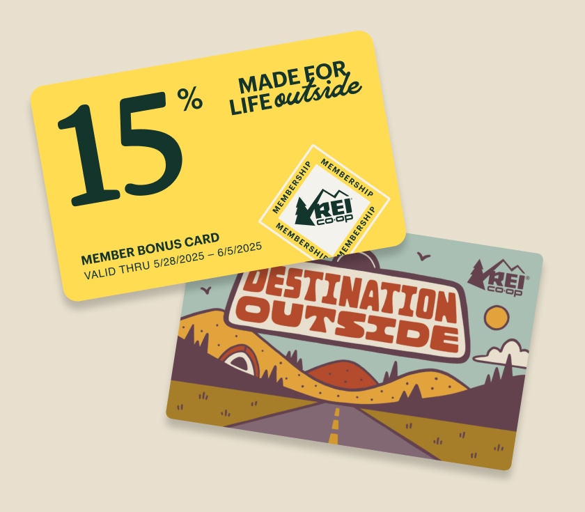 A 15% member bonus card that reads 'Made for life outside' & an R E I gift card that reads 'Destination outside' with an image of a road leading to mountains.