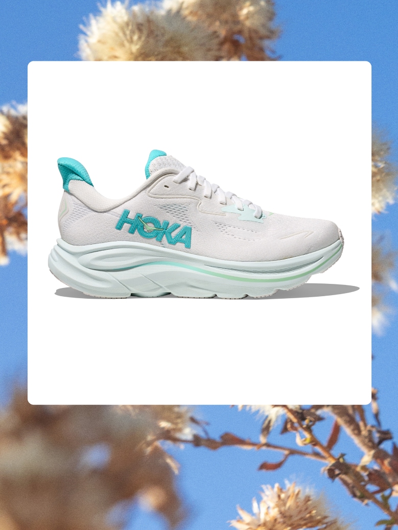 A HOKA women’s running shoe over an image of flowers.