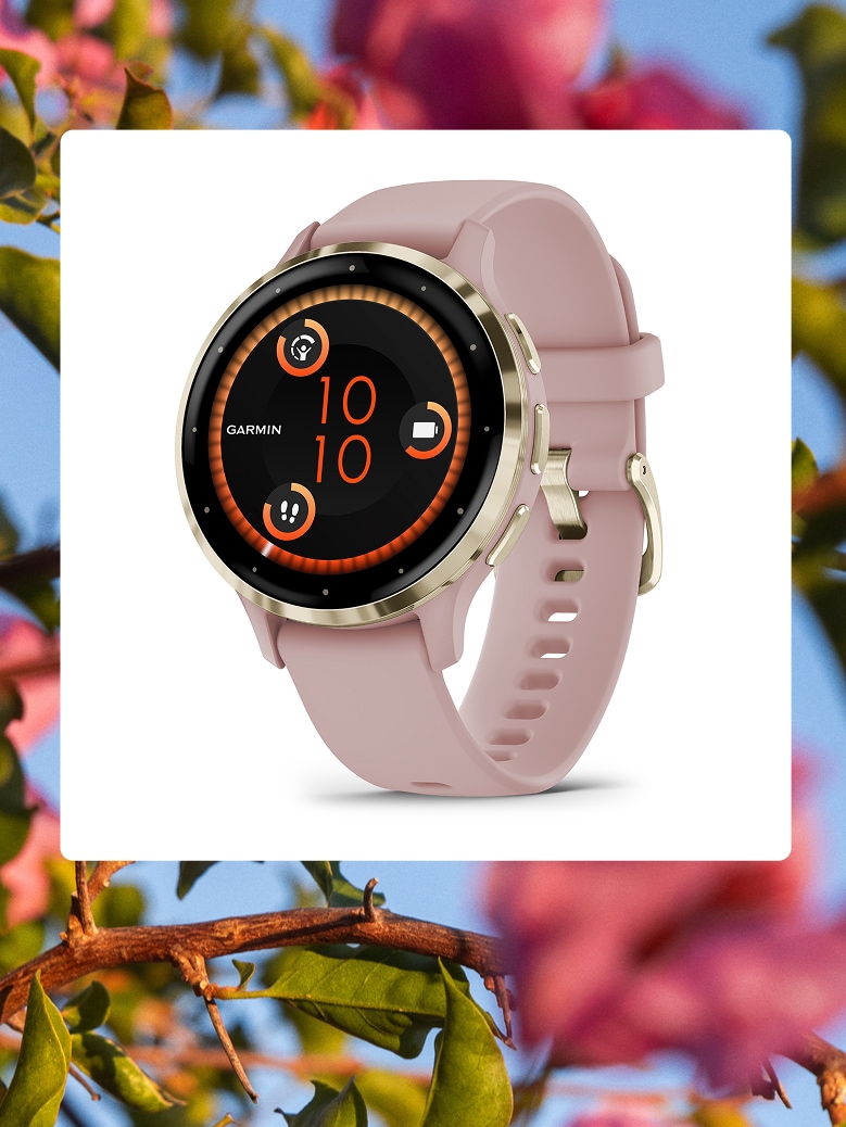 A women’s Garmin watch over an image of pink flowers.