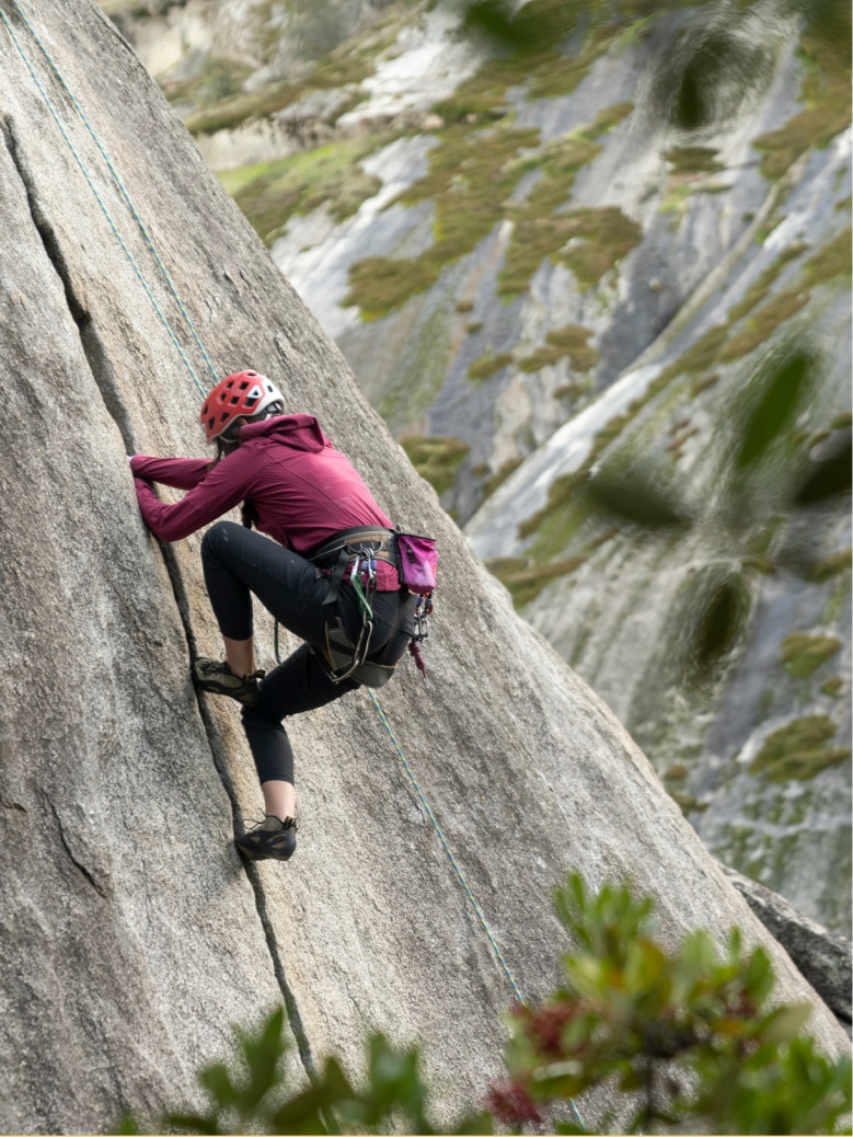 A rock climber ascending.