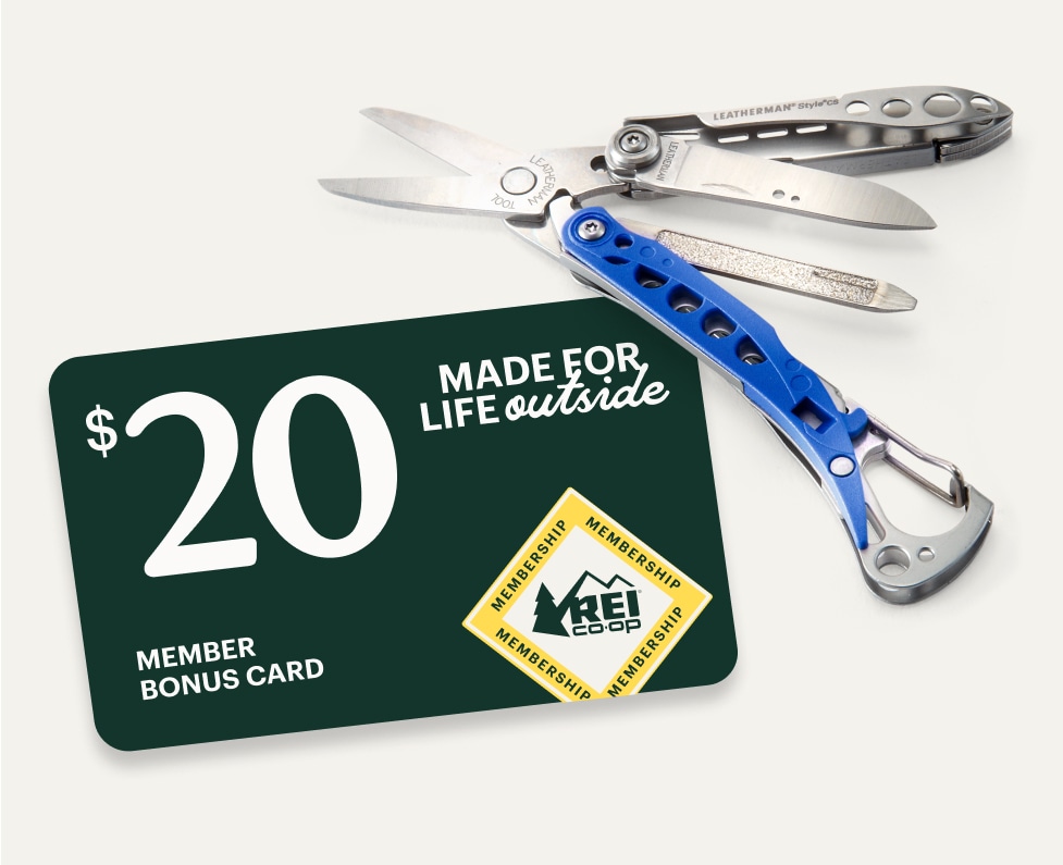 A $20 member bonus card that reads ‘made for life outside’ & a Leatherman multi-tool.