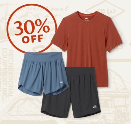 Clothing from the R E I Co-op Swiftland brand. A collage of vintage-inspired outdoorsy icons.
