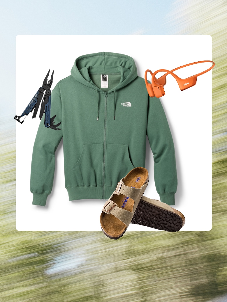 A North Face zip-up jacket, Birkenstock sandals, Shokz headphones, & a Leatherman multi-tool over an image of trees.