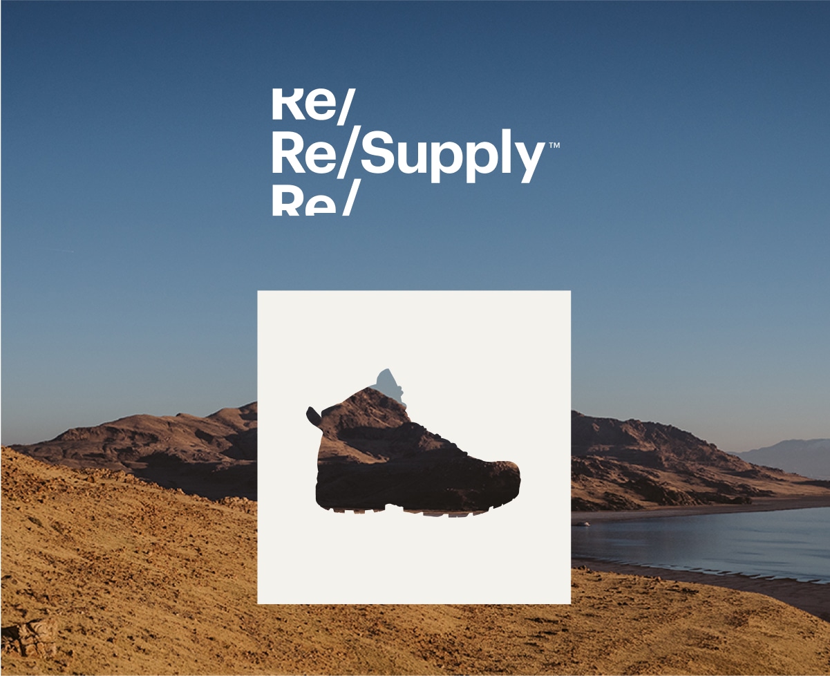 A cutout of a hiking boot over an image of a lake.