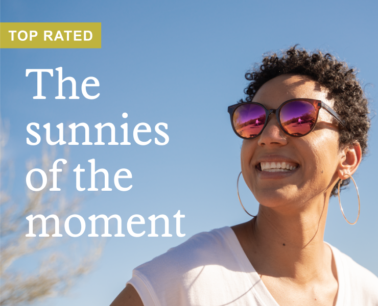 A woman with a beaming smile donning sunglasses. Headline: The sunnies of the moment. TOP RATED