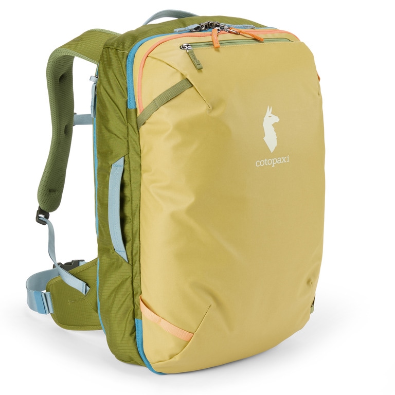 A colorful travel backpack in different shades of green and orange standing up against a white background