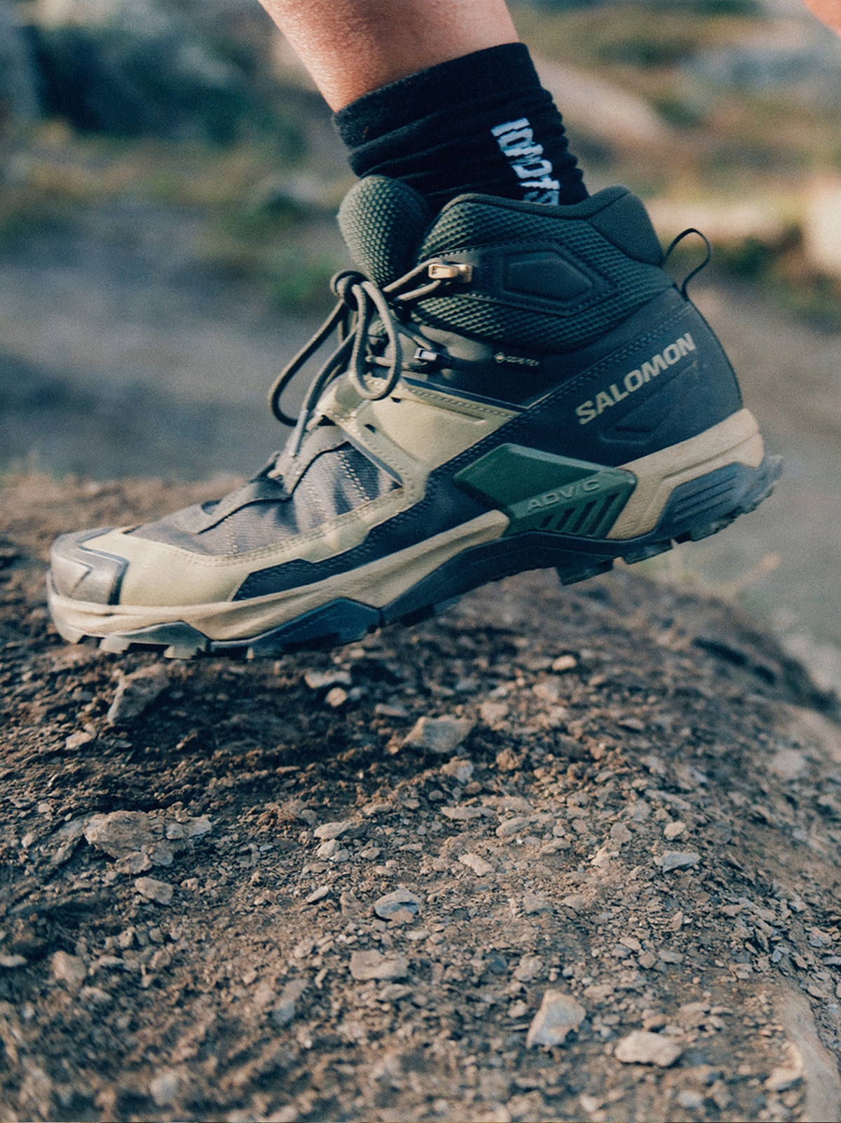 A Salomon hiking boot.