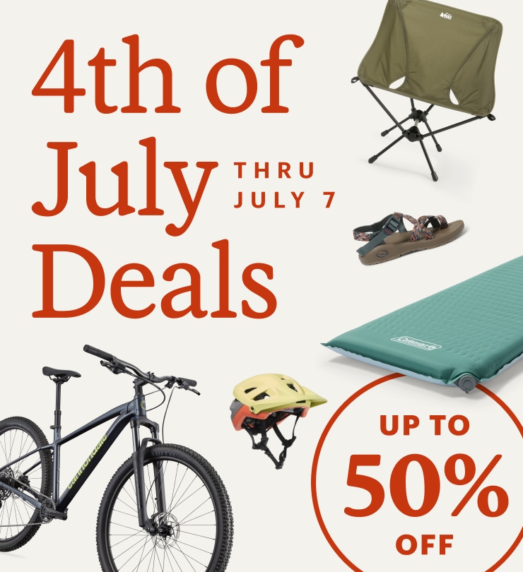 Gear on sale, including a Cannondale bike with knobby tires, a Coleman sleeping pad and more. Headline: 4th of July Deals THRU JULY 7. UP TO 50% OFF