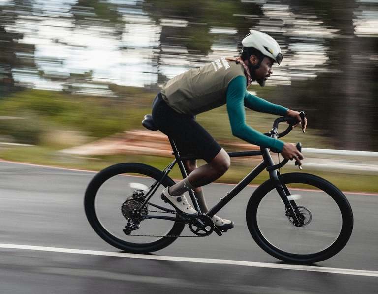 A man riding a road bike